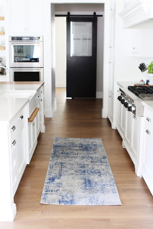 White Kitchen on twopeasandtheirpod.com This clean and crisp white kitchen is BEAUTIFUL! White Kitchen