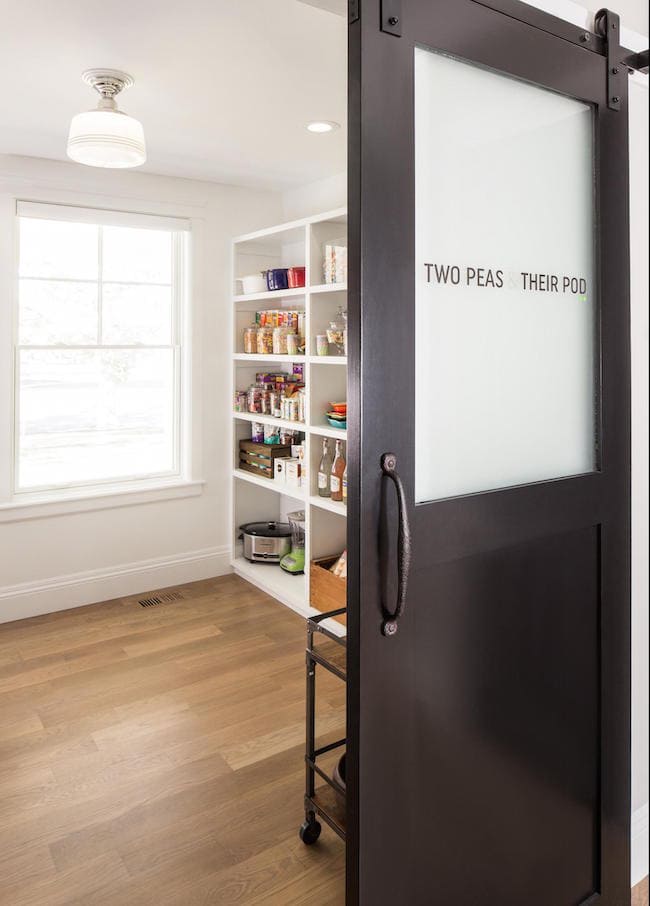 This kitchen pantry is perfect! Take the whole tour on twopeasandtheirpod.com Two Peas and Their Pod Pantry