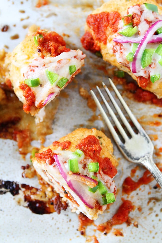 Pizza Stuffed Chicken Roll-Ups Recipe on twopeasandtheirpod.com This easy chicken dinner is a family favorite. Easy Pizza Stuffed Chicken Roll-Ups