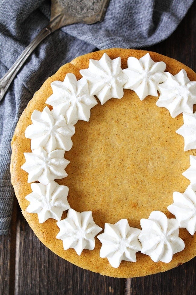 Pumpkin Cheesecake with Brown Butter Gingersnap Crust Recipe on twopeasandtheirpod.com This creamy and rich pumpkin cheesecake is perfect for fall and holiday celebrations. The brown butter gingersnap crust is perfection! Pumpkin Cheesecake with Brown Butter Gingersnap Crust