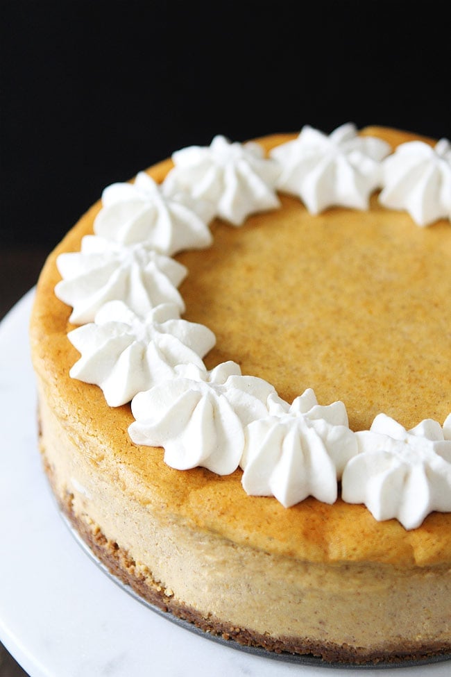 Pumpkin Cheesecake with Brown Butter Gingersnap Crust Recipe on twopeasandtheirpod.com This creamy and rich pumpkin cheesecake is the BEST dessert! Add it to your Thanksgiving menu! Pumpkin Cheesecake with Brown Butter Gingersnap Crust Recipe