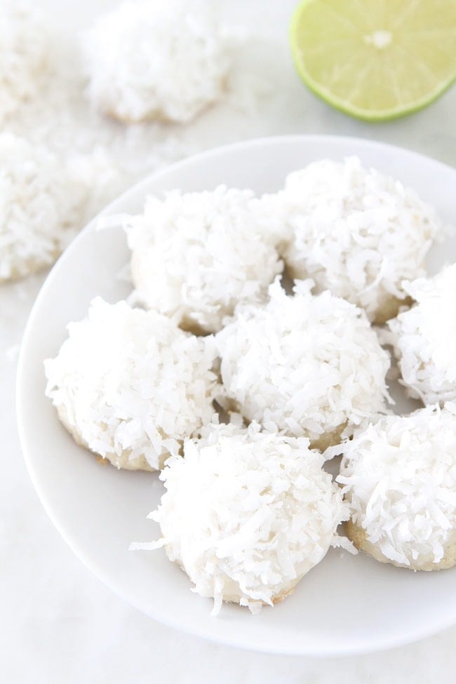 Lime Coconut Snowball Cookie Recipe on twopeasandtheirpod.com These are our FAVORITE cookies. A fun cookie for the holidays or anytime! Lime Coconut Snowball Cookie Recipe