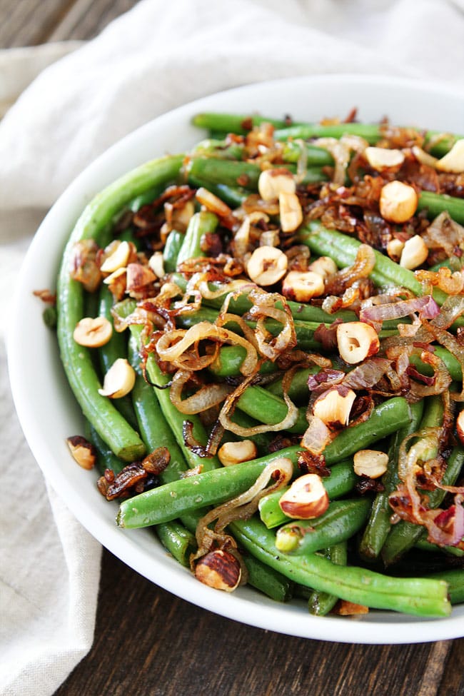 Green Beans with Brown Butter, Crispy Shallots, and Hazelnuts Recipe on twopeasandtheirpod.com This easy vegetable side dish goes great with any meal. Green Beans with Brown Butter, Crispy Shallots, and Hazelnuts Recipe