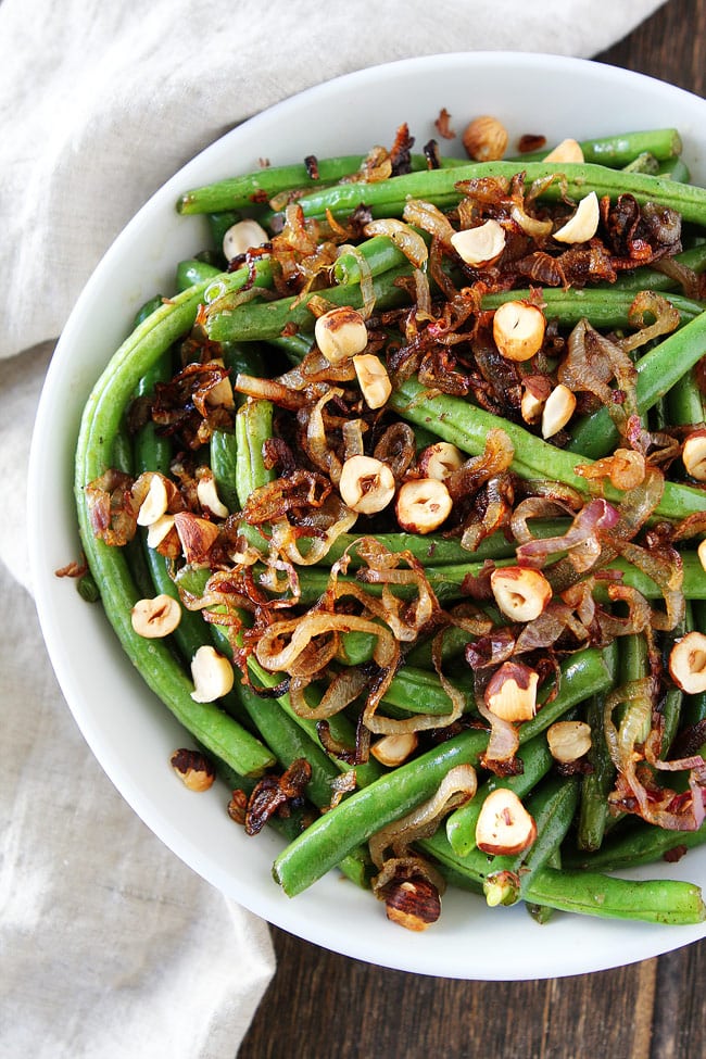 Green Beans with Brown Butter, Crispy Shallots, and Hazelnuts Recipe on twopeasandtheirpod.com This easy vegetable side dish goes great with any meal. Green Beans with Brown Butter, Crispy Shallots, and Hazelnuts Recipe