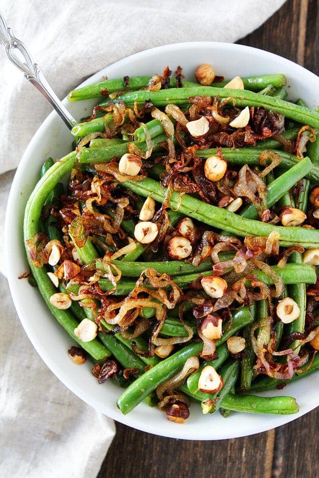 Green Beans with Brown Butter, Crispy Shallots, and Hazelnuts Recipe on twopeasandtheirpod.com This easy vegetable side dish is perfect for all of your holiday meals! Green Beans with Brown Butter, Crispy Shallots, and Hazelnuts Recipe