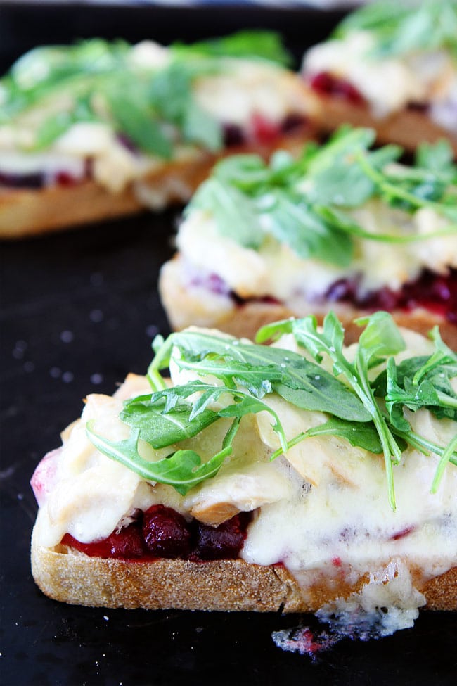 Leftover Turkey Cranberry Melts Recipe on twopeasandtheirpod.com Use your leftover turkey to make these easy, cheesy, and delicious turkey melts! Leftover Turkey Cranberry Melts Recipe