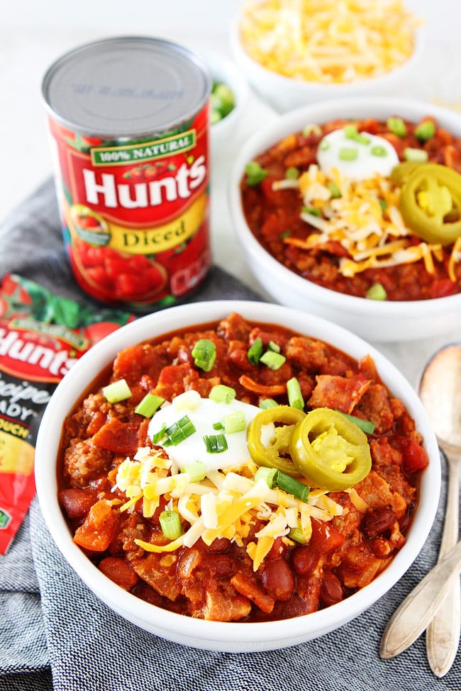 Smoky Bacon Chili Recipe on twopeasandtheirpod.com Meat lovers will go crazy for this chili. It is made with sausage, beef, and BACON! It is perfect for game day or any day! Smoky Bacon Chili Recipe