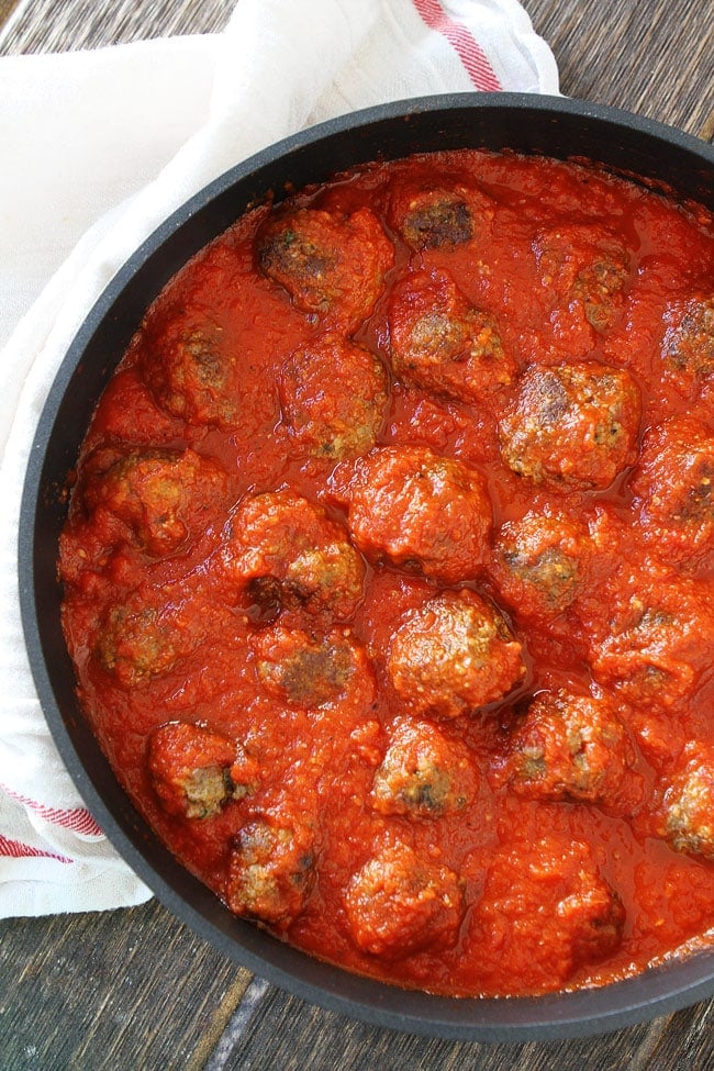 Spaghetti and Meatballs Recipe on twopeasandtheirpod.com Skillet of Meatballs in Marinara Sauce