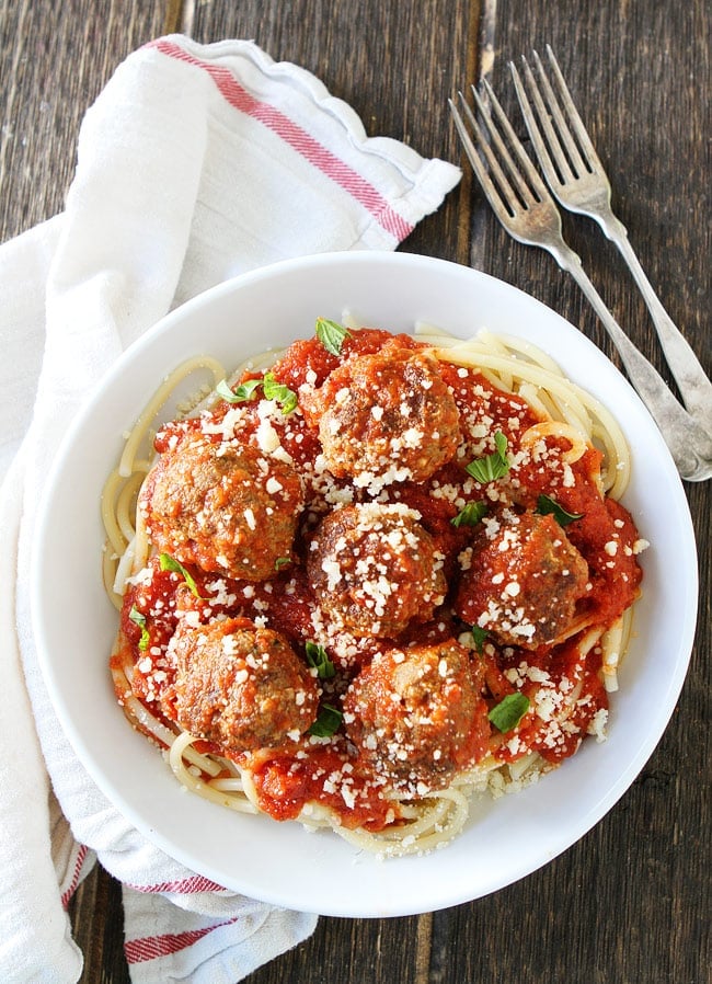 Spaghetti and Meatballs Recipe on twopeasandtheirpod.com Easy homemade meatballs served over a bed of spaghetti with hearty marinara sauce. This pasta favorite is guaranteed to please the entire family! Hearty Bowl of Spaghetti and Meatballs