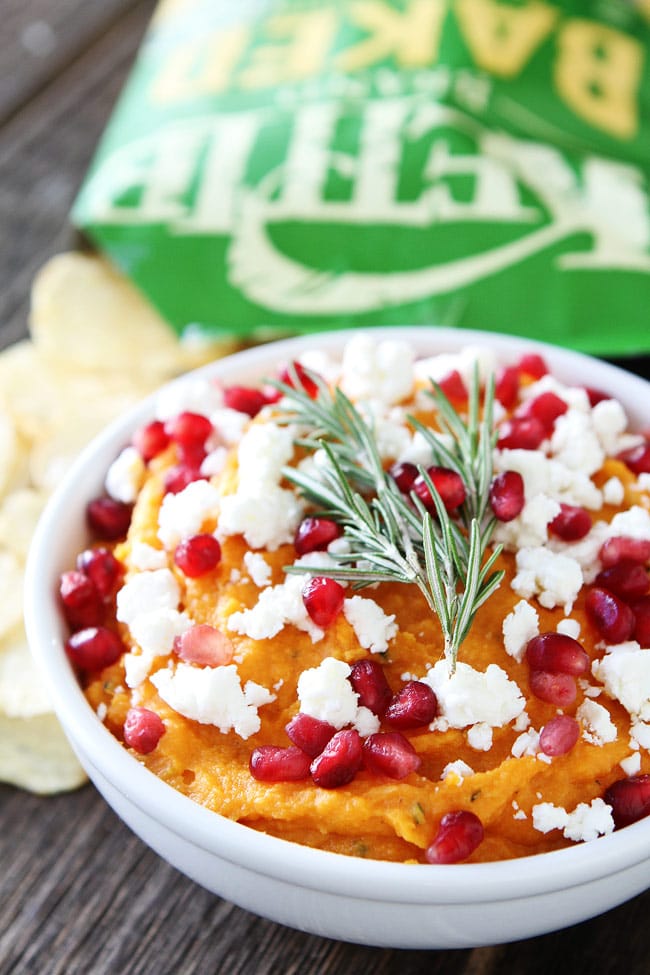 Sweet Potato Hummus Recipe on twopeasandtheirpod.com Simple sweet potato hummus with roasted garlic, rosemary, feta cheese, and pomegranate. This is the perfect holiday appetizer! Sweet Potato Hummus Recipe