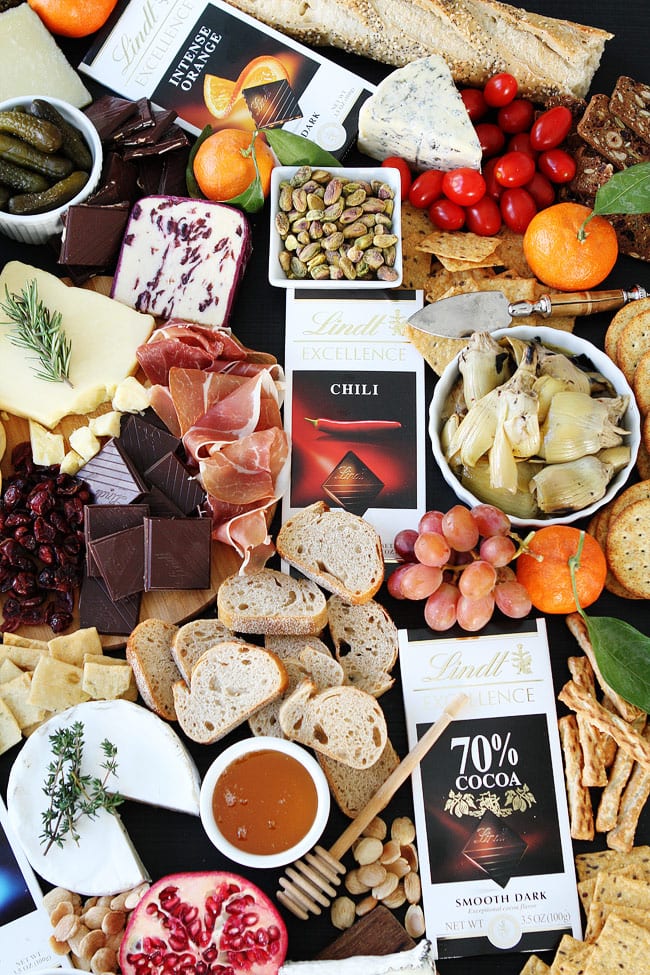 Cheese and Chocolate Board Recipe on twopeasandtheirpod.com This simple cheese and chocolate board is perfect for any party! Cheese and Chocolate Board Recipe