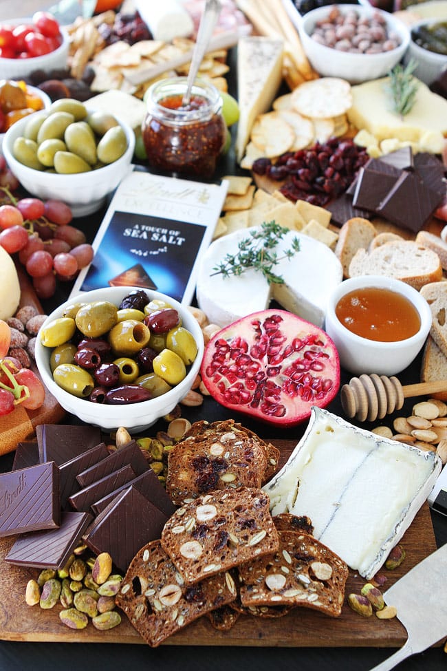 Cheese and Chocolate Board Recipe on twopeasandtheirpod.com This simple cheese and chocolate board is perfect for any party! Cheese and Chocolate Board Recipe