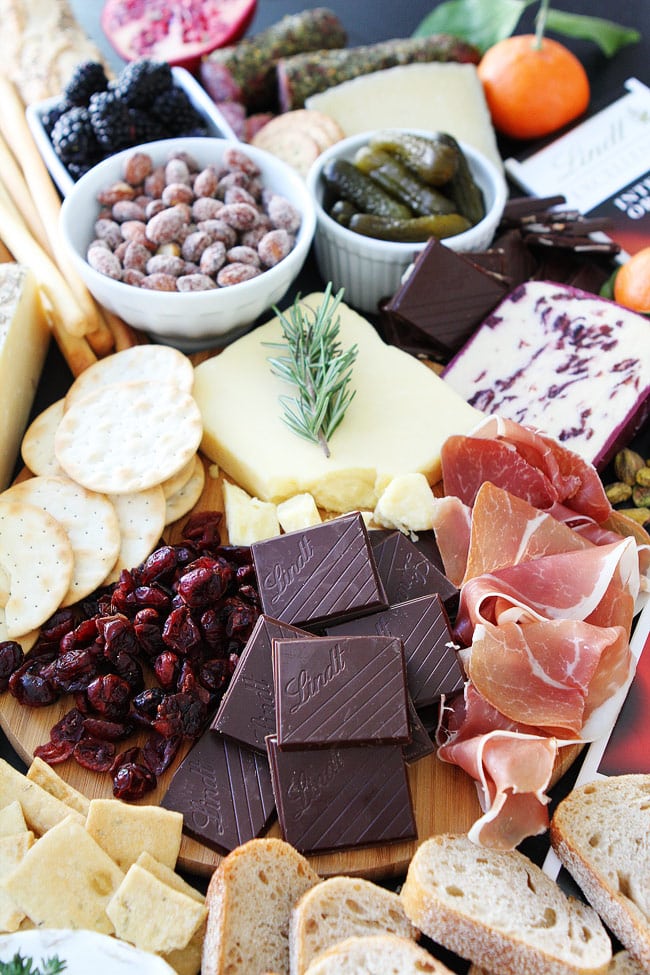 Cheese and Chocolate Board Recipe on twopeasandtheirpod.com This simple cheese and chocolate board is perfect for any party! Cheese and Chocolate Board Recipe