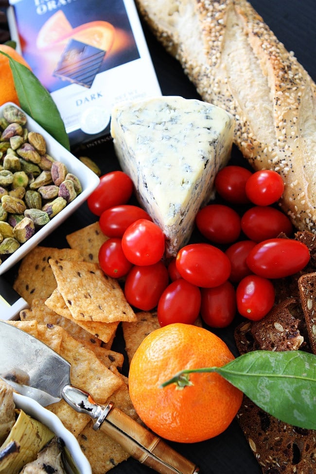 Cheese and Chocolate Board Recipe on twopeasandtheirpod.com This simple cheese and chocolate board is perfect for any party! Cheese and Chocolate Board Recipe