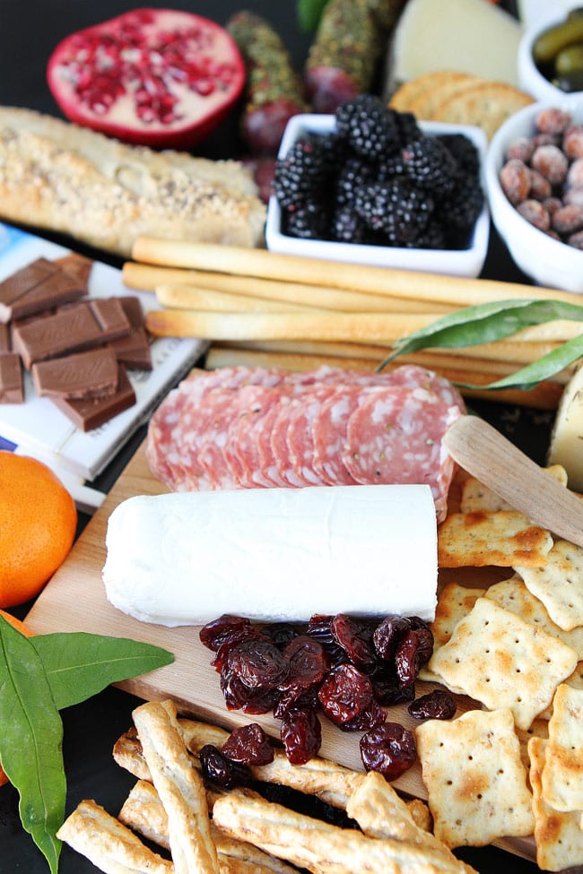 Cheese and Chocolate Board Recipe on twopeasandtheirpod.com This simple cheese and chocolate board is perfect for any party! Cheese and Chocolate Board Recipe