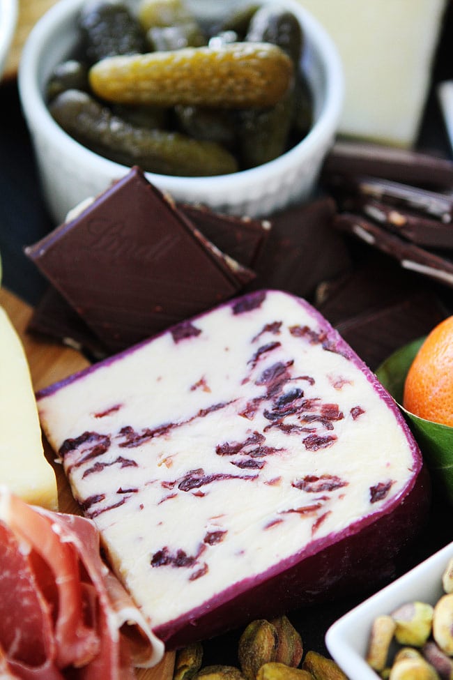 Cheese and Chocolate Board Recipe on twopeasandtheirpod.com This simple cheese and chocolate board is perfect for any party! Cheese and Chocolate Board Recipe