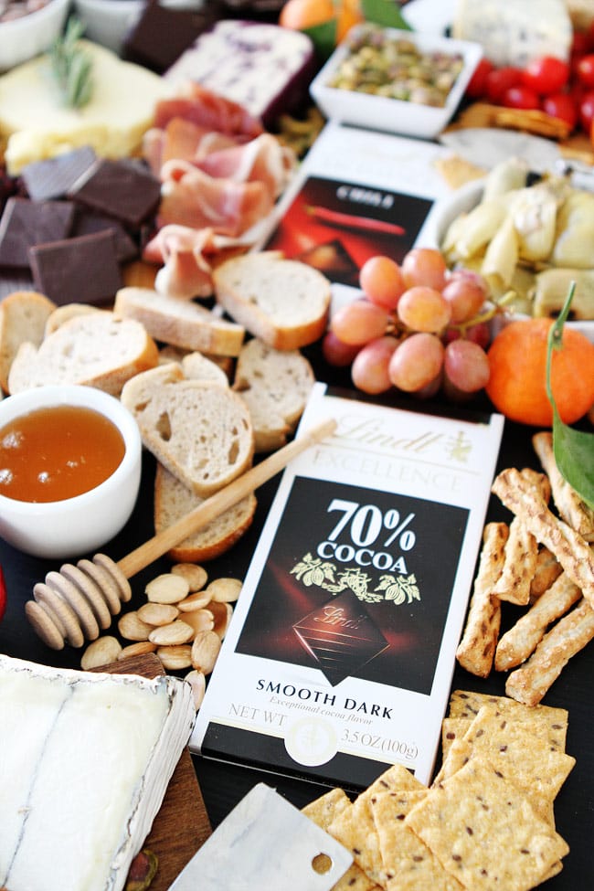 Cheese and Chocolate Board Recipe on twopeasandtheirpod.com This simple cheese and chocolate board is perfect for any party! Cheese and Chocolate Board Recipe