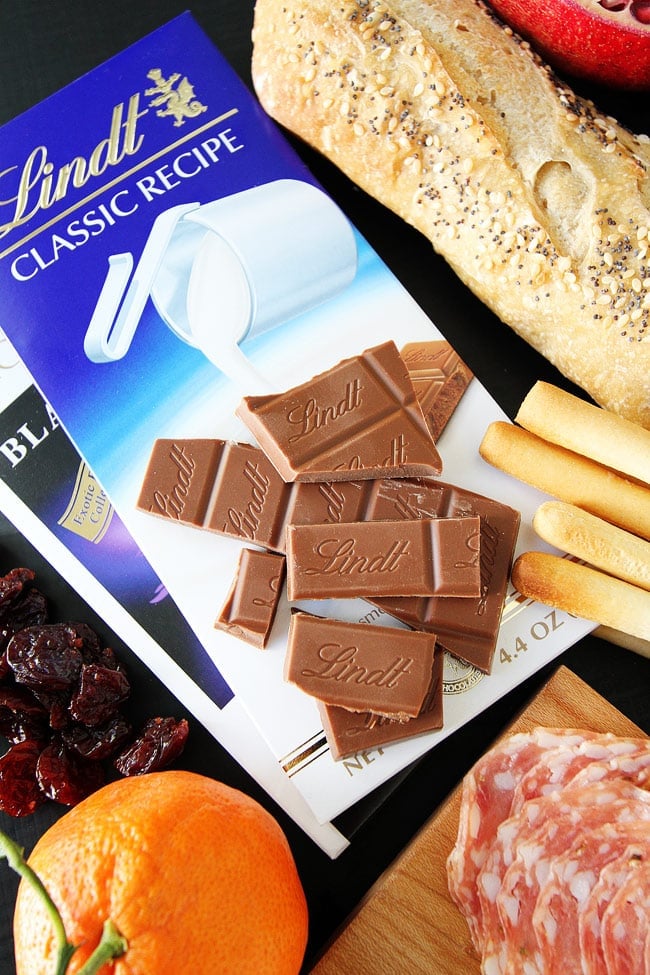 Cheese and Chocolate Board Recipe on twopeasandtheirpod.com This simple cheese and chocolate board is perfect for any party! Cheese and Chocolate Board Recipe