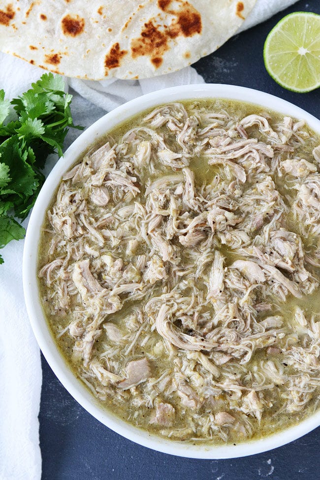 4-Ingredient Instant Pot Chicken Chile Verde Recipe on twopeasandtheirpod.com This easy Instant Pot chicken recipe is a weeknight favorite! pressure cooker chili verde made in 25 minutes