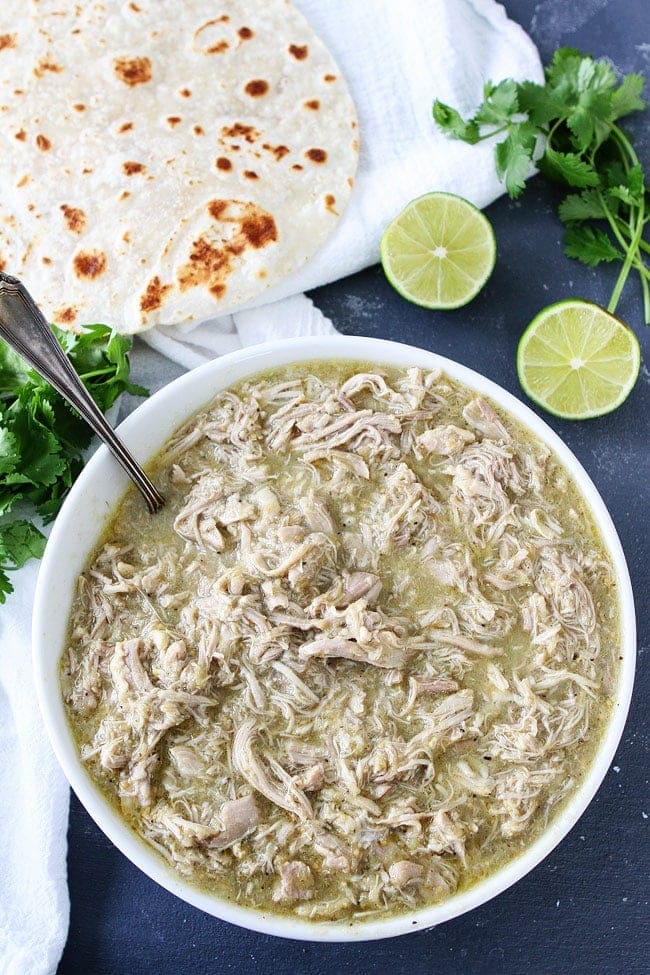 4-Ingredient Instant Pot Chicken Chile Verde Recipe on twopeasandtheirpod.com This easy Instant Pot chicken recipe is a weeknight favorite! how to make chile verde in an instant pot
