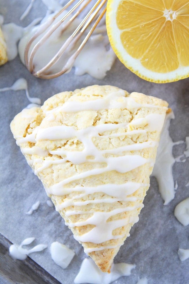 Lemon Cream Cheese Scone Recipe on twopeasandtheirpod.com These soft and tender lemon scones are made with butter and cream cheese! They are bursting with lemon flavor and perfect for breakfast or brunch! Scone recipe with lemon glaze