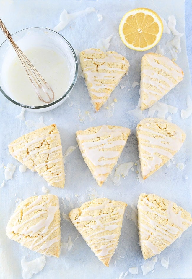 Lemon Cream Cheese Scone Recipe on twopeasandtheirpod.com These soft and tender lemon scones are made with butter and cream cheese! They are great for breakfast or brunch! Scone recipe with cream cheese and lemon glaze