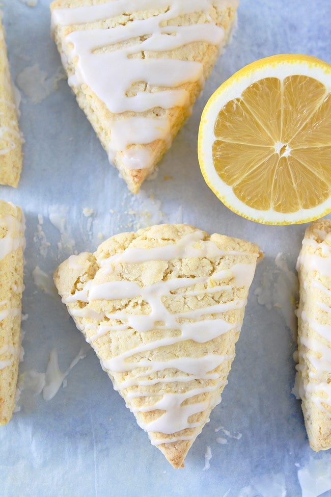 Lemon Cream Cheese Scone Recipe on twopeasandtheirpod.com These soft and tender lemon scones are made with butter and cream cheese! They are great for breakfast or brunch! Scone recipe with lemon icing