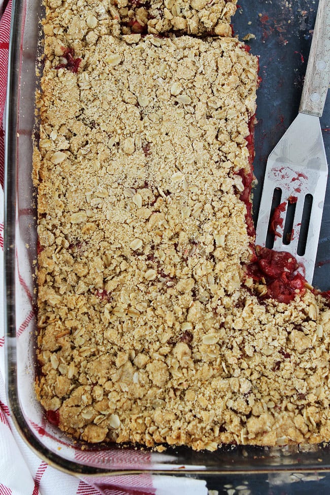 Cherry Oatmeal Bars Recipe on twopeasandtheirpod.com If you like cherry pie you will LOVE these easy bars! They are so good with vanilla ice cream! Cherry Oatmeal Bars in pan