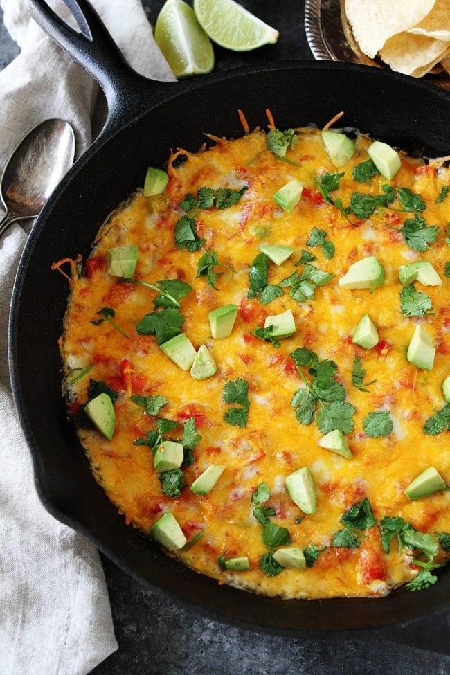 Easy Skillet Queso Dip Recipe on twopeasandtheirpod.com This easy, cheesy dip is perfect for parties, game day, or any day! Serve it warm, right out of the oven, with tortilla chips! Easy Skillet Queso Dip Recipe