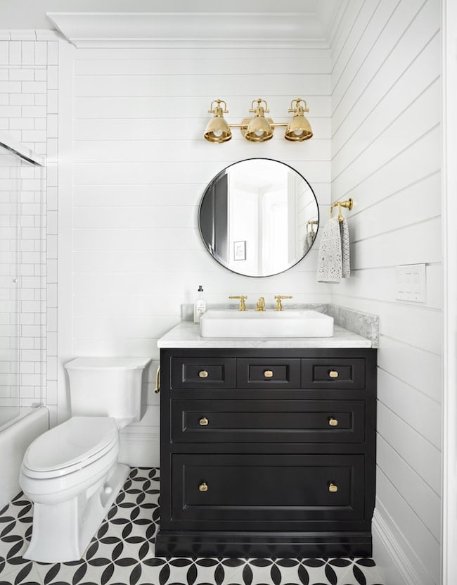 Guest Bathroom on twopeasandtheirpod.com This black and white powder room is perfection! Guest Bathroom