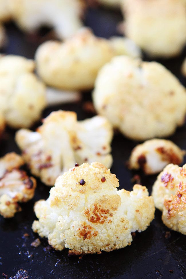 Roasted Mustard Cauliflower Recipe on twopeasandtheirpod.com This easy roasted cauliflower recipe is full of flavor and a great side dish to any meal! Roasted Mustard Cauliflower Recipe