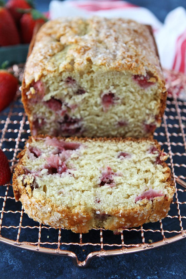 This easy Strawberry Quick Bread Recipe is made with Greek yogurt, buttermilk, and fresh strawberries. It is tender, moist, and great for breakfast, brunch, or snacking. Strawberry Bread Recipe