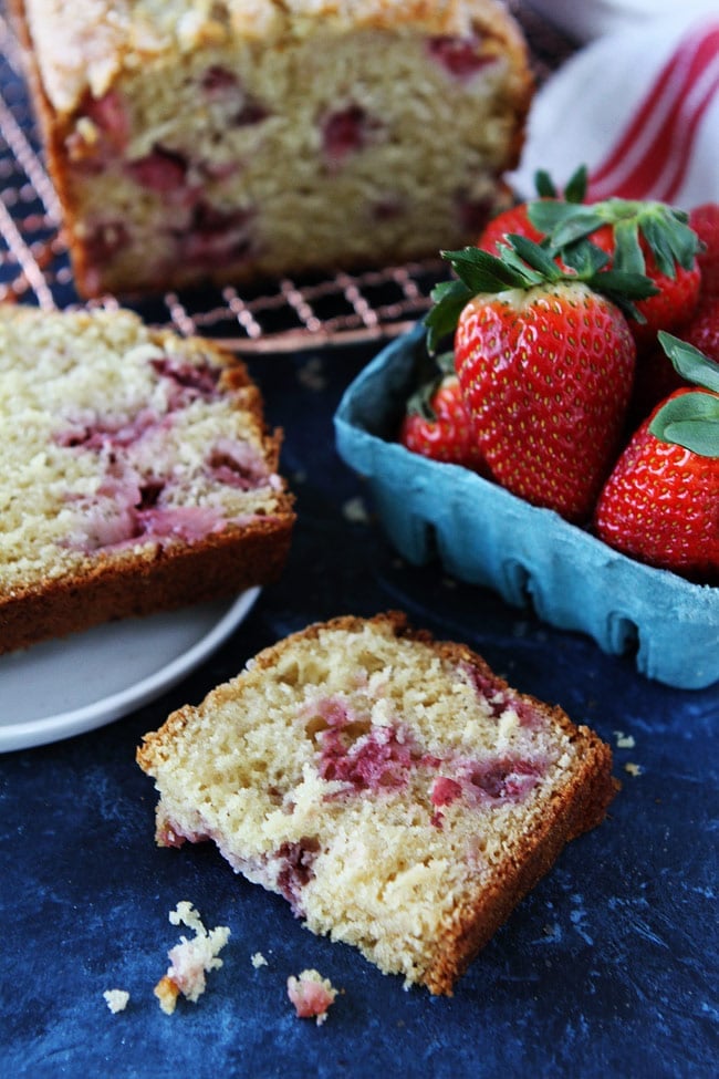 This easy Strawberry Quick Bread Recipe is made with Greek yogurt, buttermilk, and fresh strawberries. It is easy to make and a great treat for spring and summer! Strawberry Bread Recipe