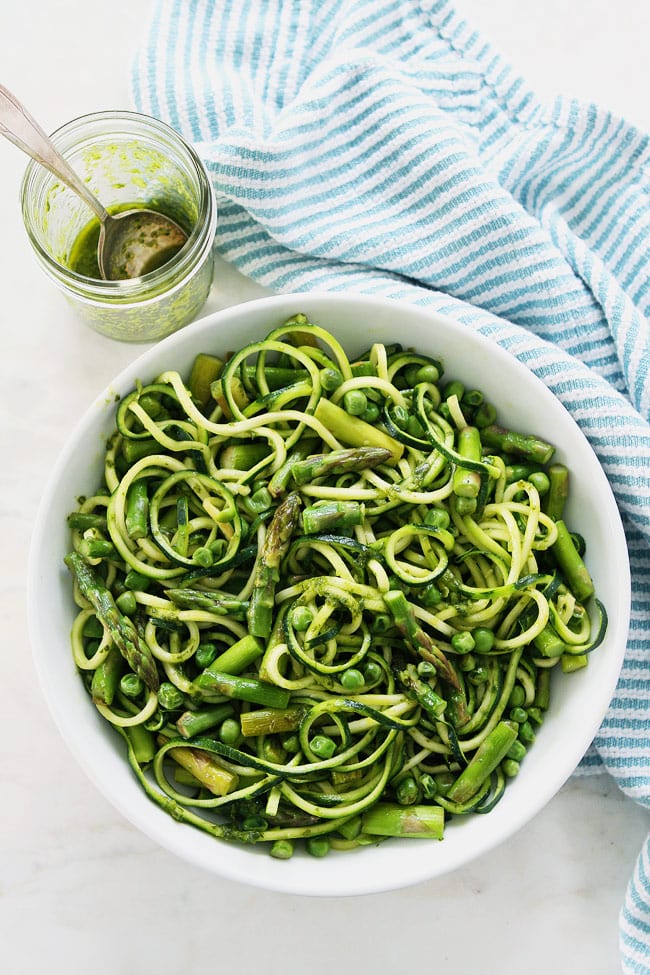 Zucchini Noodles with Asparagus, Peas, and Basil Vinaigrette Recipe on twopeasandtheirpod.com This gluten-free and vegan zucchini noodle dish is perfect for spring. It is light, refreshing, and super simple to make. Zucchini Noodles with Asparagus, Peas, and Basil Vinaigrette Recipe