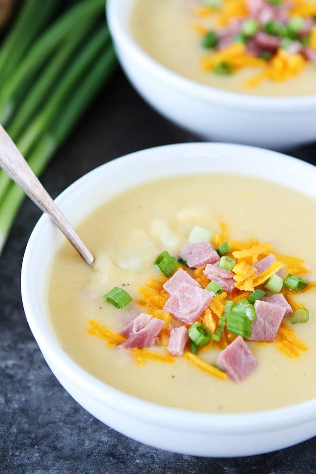 Cheesy Ham and Potato Soup Recipe on twopeasandtheirpod.com This easy Cheesy Ham and Potato Soup is the perfect recipe to use up your leftover Easter or Christmas ham. The soup is creamy, comforting, and so easy to make! Cheesy Ham and Potato Soup Recipe