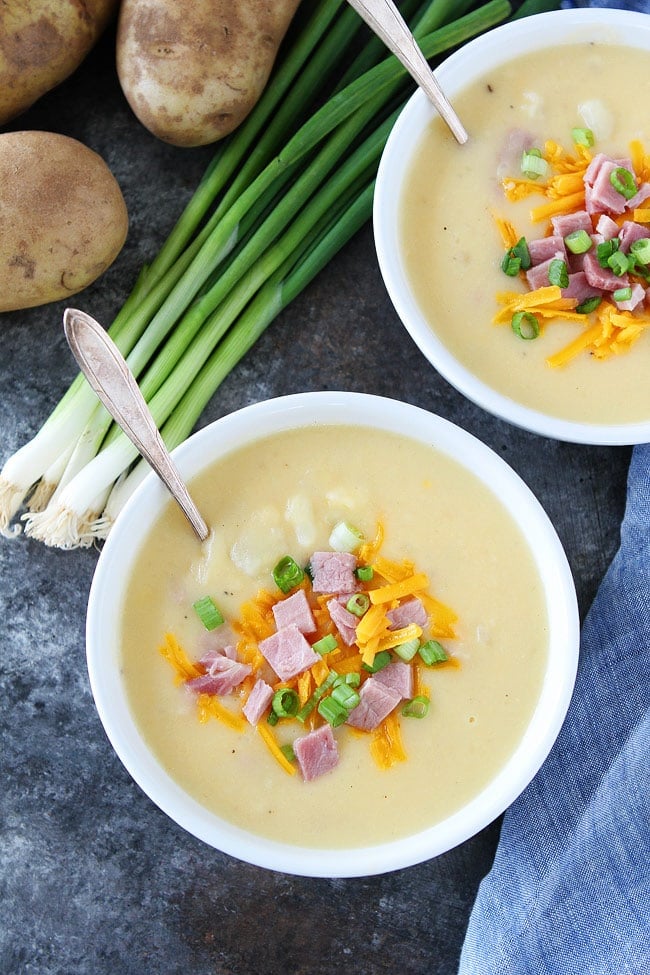 Cheesy Ham and Potato Soup Recipe on twopeasandtheirpod.com Use your leftover holiday ham to make this creamy, comforting, and cheesy ham and potato soup! It is great for dinner or lunch! Cheesy Ham and Potato Soup Recipe