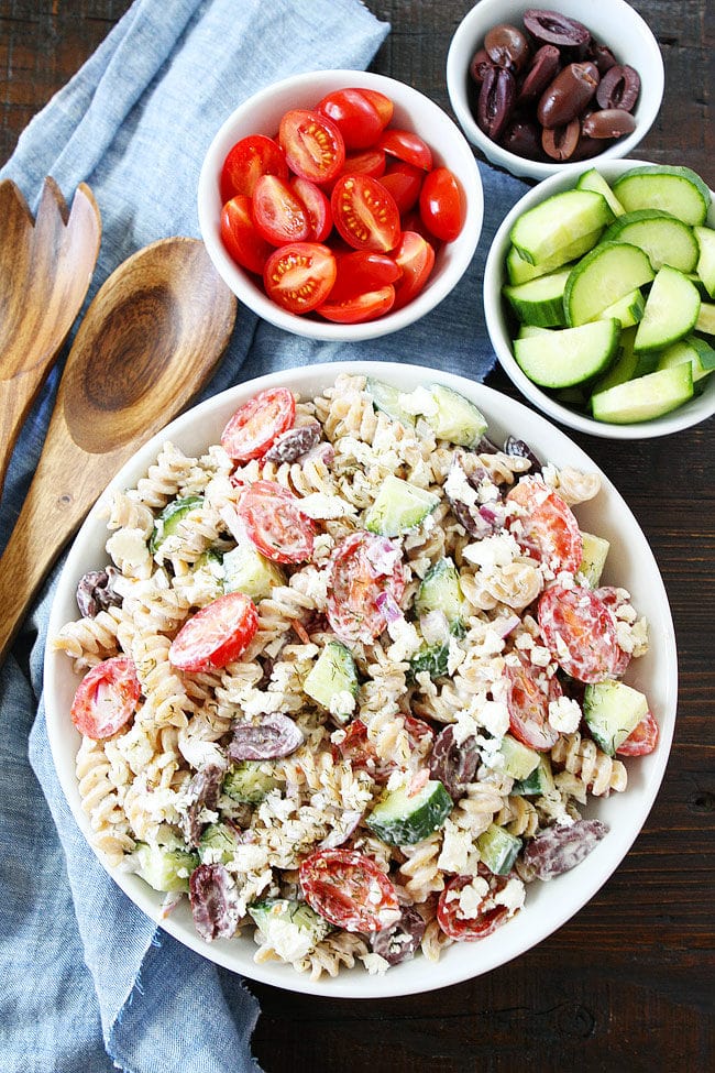 Creamy Greek Pasta Salad is an easy side dish for potlucks, barbecues, and picnics Creamy Pasta Salad with Feta Cheese in Serving Dish