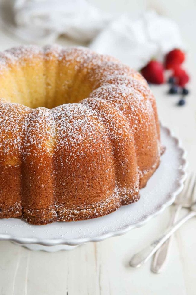 Cream Cheese Pound Cake made in a bundt pan. This easy cake is a great dessert for any occasion. Cream Cheese Pound Cake made in a bundt pan and sprinkled with powdered sugar