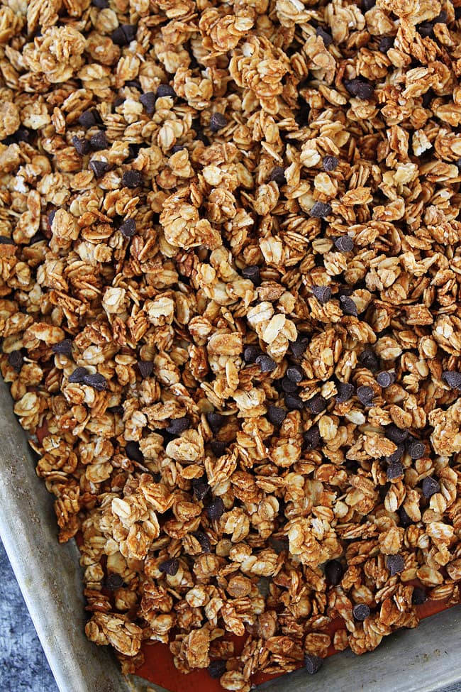 You only need 4 ingredients to make this Peanut Butter Granola Recipe! It is the BEST! #peanutbutter #granola #breakfast #snack #vegetarian #glutenfree How to make granola - baking in oven