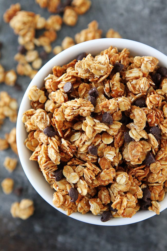 4-Ingredient Peanut Butter Granola is a family favorite breakfast and snack! #granola #peanutbutter #chocolate #breakfast #snack #glutenfree Peanut Butter Granola Recipe with mini chocolate chips