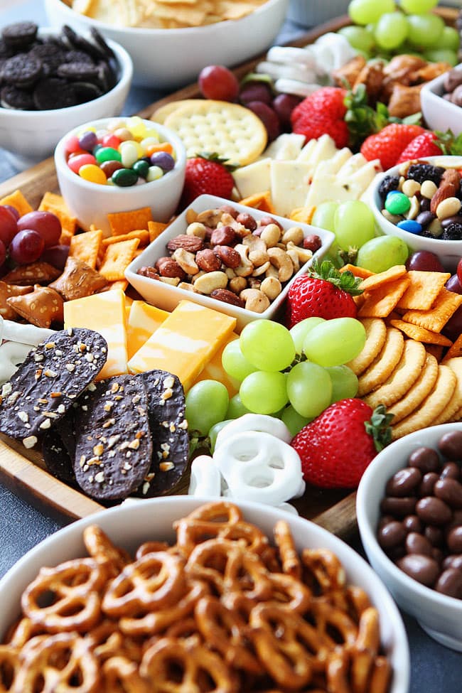 Sweet and Salty Snack Board-the perfect party food for easy entertaining. You will love the mix of sweet and salty snacks for game day or any party!