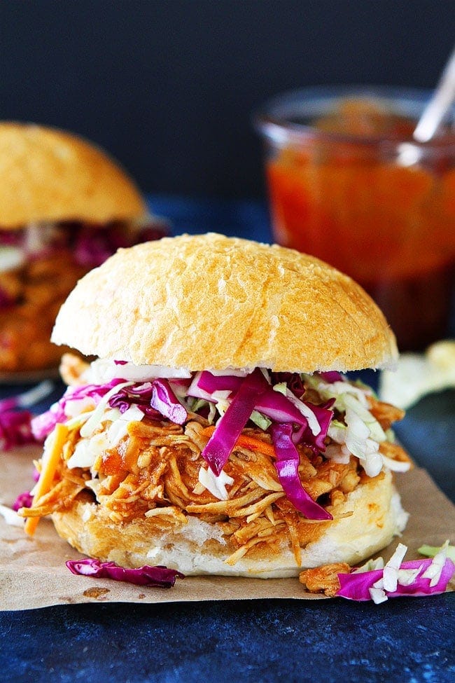 This Easy Slow Cooker BBQ Chicken Is The Perfect Meal For Busy Weeknight Dinners Or Easy Entertaining. And The Best Part? You Only Need 3 Ingredients! #slowcooker #crockpot #chicken #chickenrecipes #easyrecipes Slow Cooker BBQ Chicken sandwich