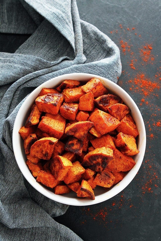 Smoked Paprika Roasted Sweet Potatoes are the perfect healthy side dish to any meal! #sweetpotatoes #sidedish #healthyrecipe #easyrecipe #glutenfree #vegan #vegetarian #potatoes Smoked Paprika Roasted Sweet Potatoes