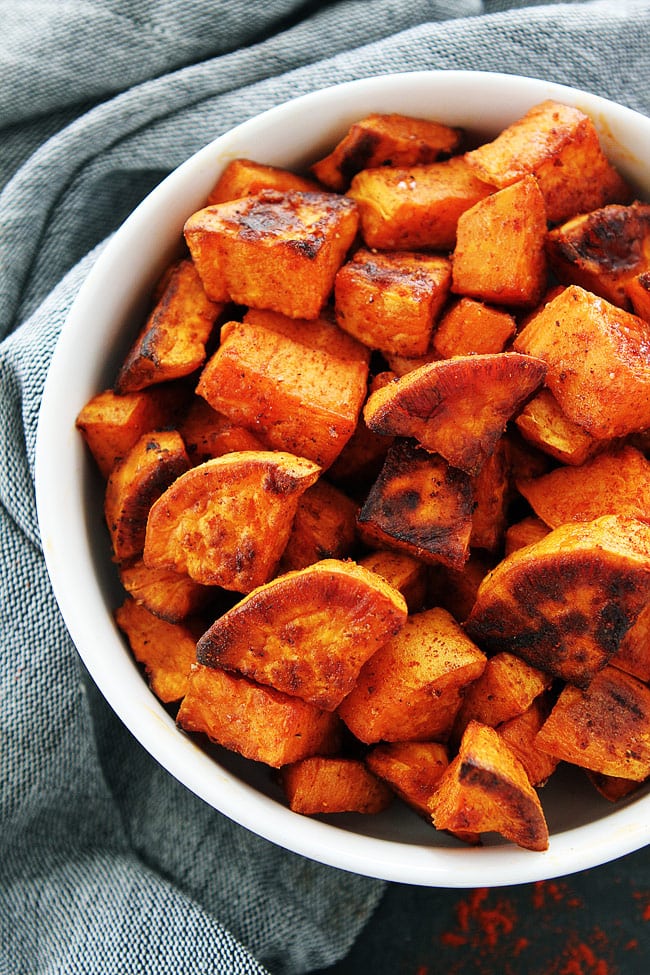 Smoked Paprika Roasted Sweet Potatoes are the perfect healthy side dish! They go great with any meal and are super easy to make! #glutenfree #vegan #vegetarian #healthyrecipe #easyrecipe #sidedish #potatoes Smoked Paprika Roasted Sweet Potatoes Recipe