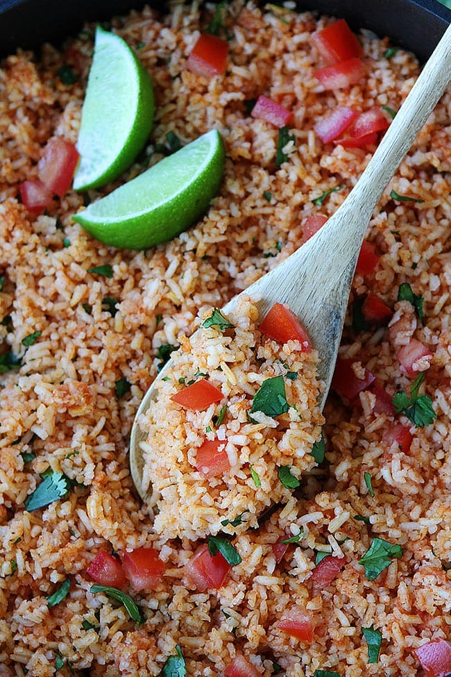 The BEST Mexican Rice Recipe! A great side dish to any Mexican meal! #Mexicanrice #rice #sidedish #easyrecipe #tomatoes #glutenfree #vegan #vegetarian Mexican Rice
