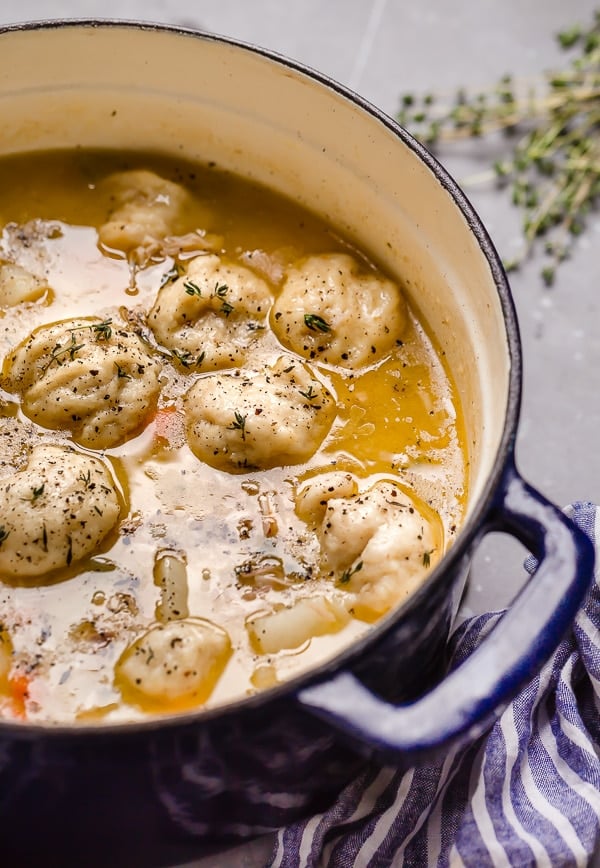 Chicken And Dumplings Are The Ultimate Comfort Food And You Will Love This Easy Homemade Recipe. The Dumplings Are Tender And Absorb The Savory Broth And Every Bowl Is Filled With Chunks Of Chicken. This Hearty Meal Is A Family Favorite! #chicken #chickenanddumplings #comfortfood #recipe #dinner #chickenrecipe #easyrecipe #dinnerrecipe #soup Chicken Dumplings in pot
