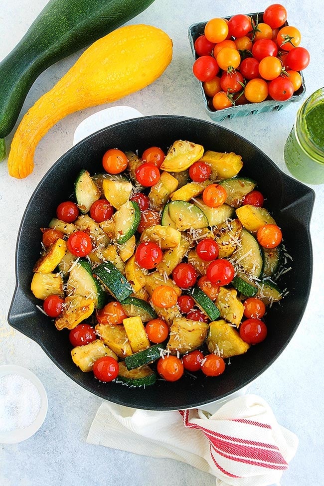 Summer Squash Sauté with tomatoes, Parmesan cheese, and basil vinaigrette! The perfect simple summer side dish! #squash #summersquash #sidedish #easyrecipe #glutenfree #vegetarian #healthyrecipe #gardening #zucchini Summer Squash Recipe