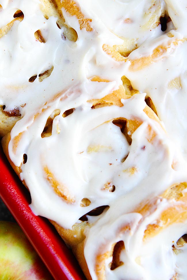 Apple Cinnamon Rolls With Brown Butter Frosting-These Light And Fluffy Cinnamon Rolls Will Remind You Of Apple Pie, But In Cinnamon Roll Form! They Are The Perfect Breakfast Treat For Fall! #cinnamonrolls #recipe #baking #breakfast #brunch #fall #apple #frosting #brownbutter Apple Cinnamon Rolls with frosting in pan