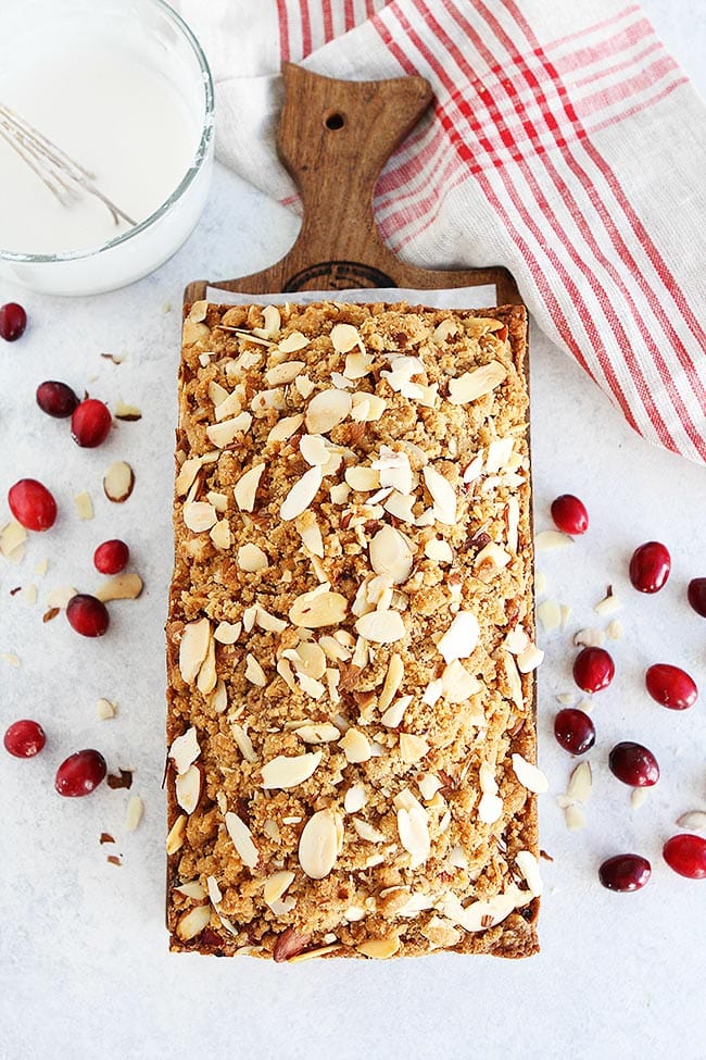 Cranberry Almond Bread-This Easy Quick Bread Is Dotted With Tart Cranberries And Topped With A Sweet Almond Streusel Topping. It Is The Perfect Cranberry Bread Recipe For The Holidays! #cranberry #Christmas #holidays #baking #bread #almond #streusel #recipe Cranberry Bread with almond streusel