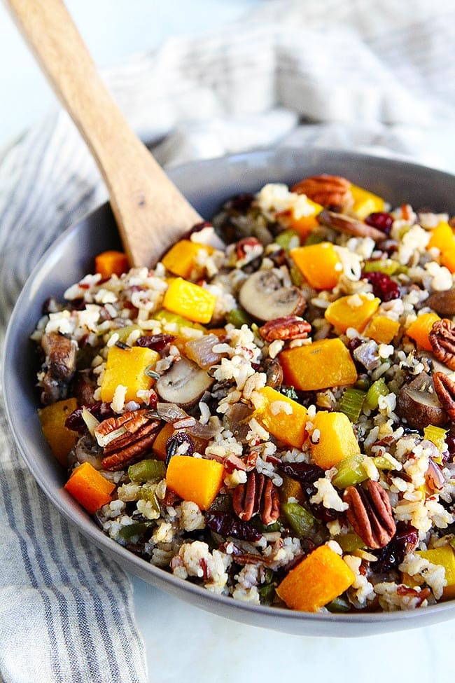 Wild Rice Stuffing With Butternut Squash, Mushrooms, Dried Cranberries, Herbs, And Pecans Is A Delicious Gluten-Free Stuffing For The Holidays! #stuffing #glutenfree #vegan #vegetarian #healthyrecipe #thanksgiving #Christmas #holidays #sidedish Wild Rice Stuffing Recipe